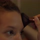 Serious Young Woman Brunette Applies Makeup at Home Macro - VideoHive Item for Sale