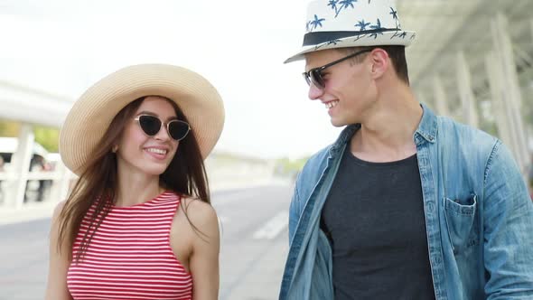 Summer Travel. Couple Traveling At Airport On Vacation