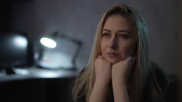 Unhappy Lady with Messy Hair Suffers From Depression in Room