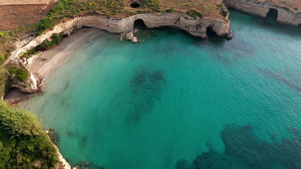 Flying over a beautiful beach with crystal water