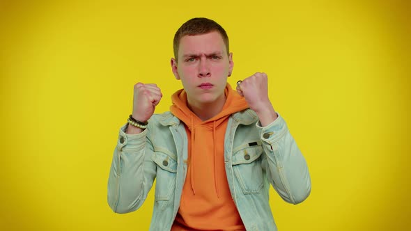 Aggressive Angry Man Trying to Fight at Camera Shaking Fist Boxing with Expression Punishment