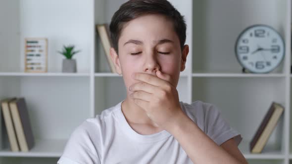 Portrait of Scared Boy Shocked By Terrible Scene Afraid Teenager Look at Camera Cover Mouth with His