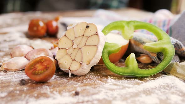 Fresh Garlic Herbs and Spices on Wooden Background