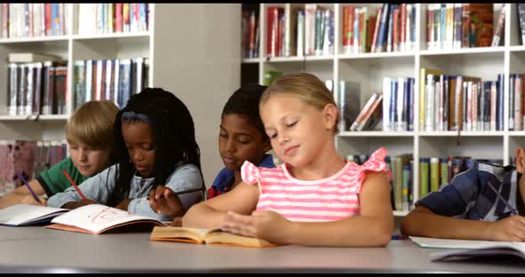 School kids studying in library