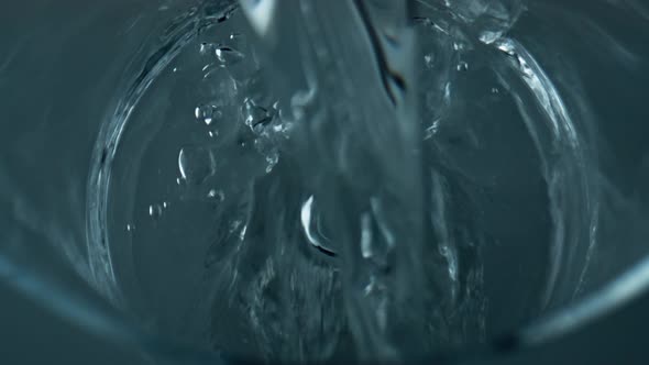 Closeup Water Stream Pouring Empty Glass