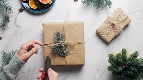 Woman Packaging Christmas Presents