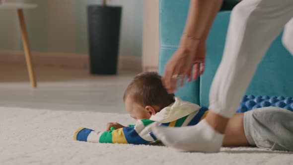 Mother Playing with Son in Living Room