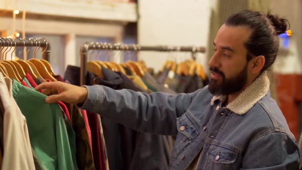 Couple Choosing Clothes at Vintage Clothing Store 30