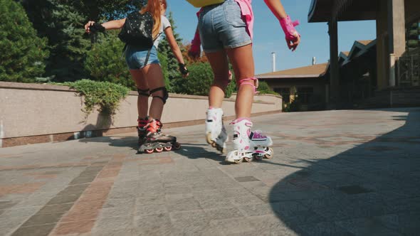 Girls Roller Skate, Close-up of Legs