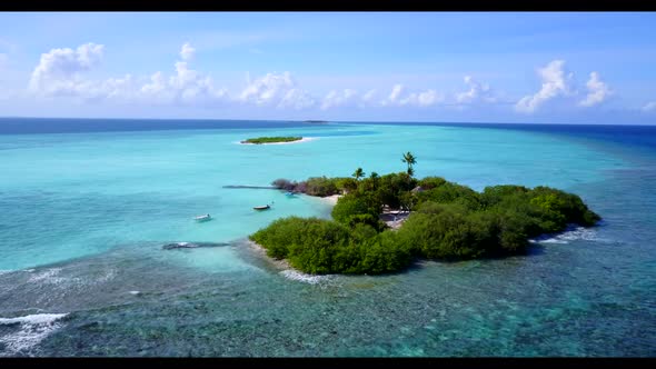 Aerial drone shot sky of paradise lagoon beach journey by blue green ocean and white sandy backgroun