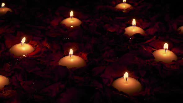 Candles In Rose Petals Romantic Setting