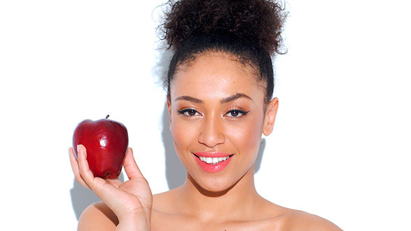 Smiling Girl Holding Red Apple