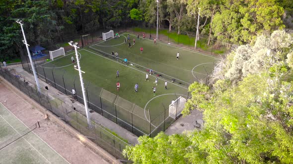 Aerial View. Amateur Training in Mini Football. Teams Compete in Speed and Accuracy.