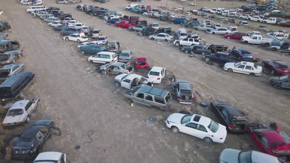 Aerial View of a Large Diversity of Damaged Cars Waiting a Junkyard