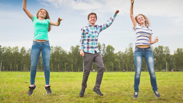 Teens Dancing in a Meadow alt