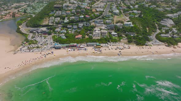 High Angle Shot of People Enjoying Sunny Day on Beach