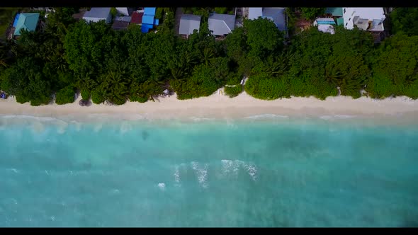 Aerial top view abstract of perfect seashore beach vacation by blue green ocean with white sandy bac