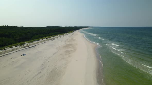 Aerial view of empty beach on the Baltic Sea shoreline. Nobody on the plage