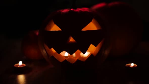 Halloween Jack-o-lantern Burning in Darkness 