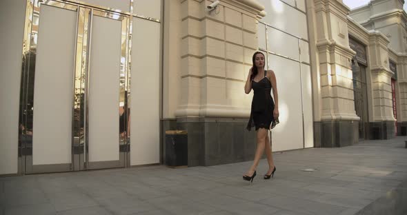 Attractive Girl Walking Shopping in the City