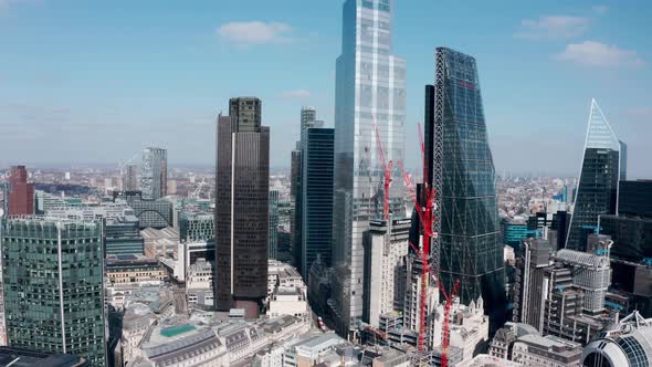 Drone shot back from Liverpool street Bishopsgate City of London on a sunny day