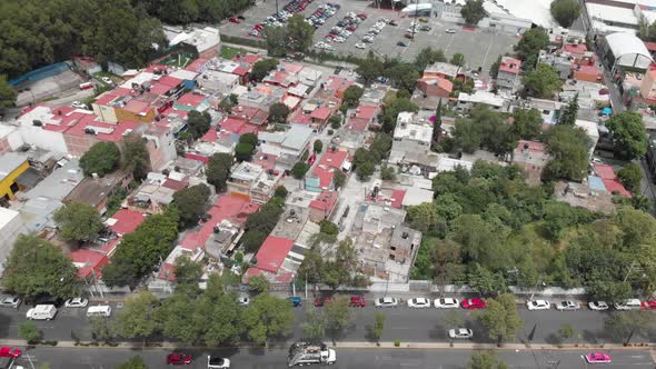 Aerial view of El Manantial neighborhood, in southern Mexico City. Drone flying over San Fernando av