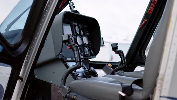 View of Pilot Cabin and Stick Joystick of Civilian Business Helicopter Cockpit is Inside