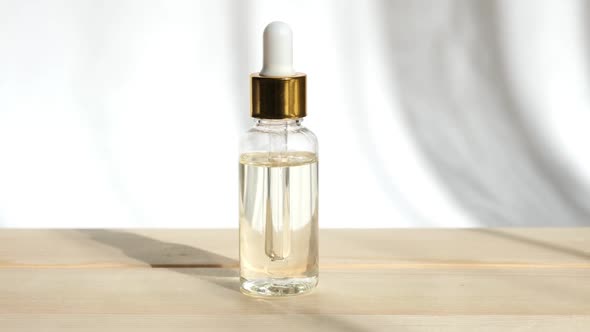 Natural Oil Cosmetics on White Background