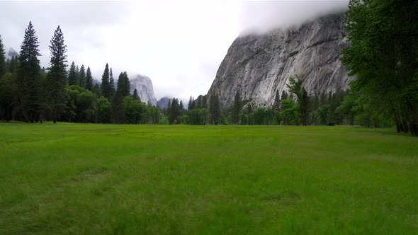 Walking through Yosemite valley on a cloudy day. 30p conformed to 24p.