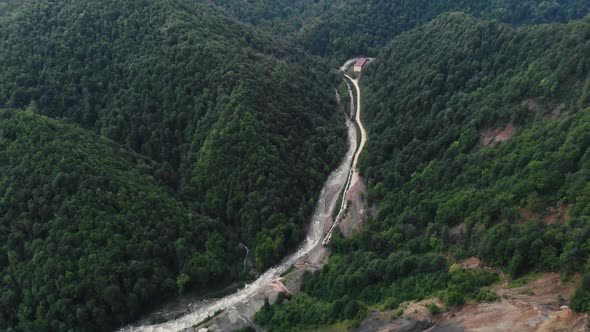  The Camera's View Rises From the Mountain River To the Horizon