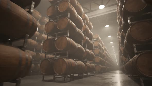 Alcohol storage. Old whiskey or wine barrels stacked in rows at the warehouse.