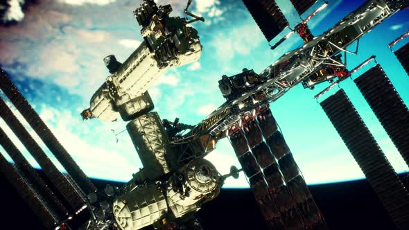 International Space Station Over the Earth Elements Furnished By NASA alt