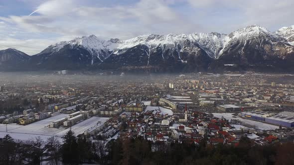 Aerial view of Innsbruck surrounded by mountains