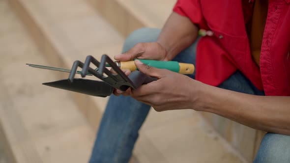 Gardening Tools in Male African American Hands