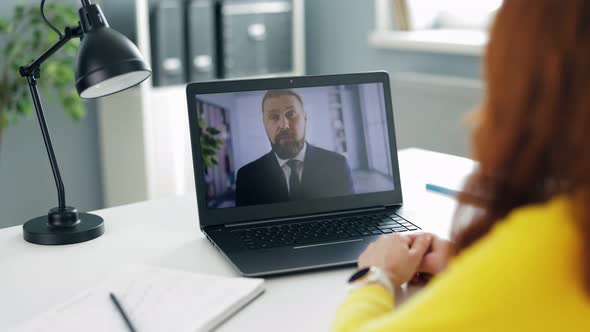 Workers on Webcam Conference