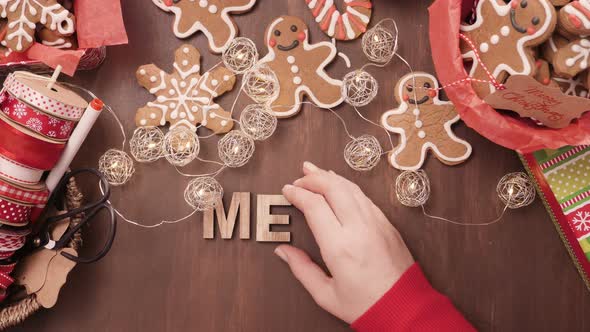 Wood Merry Christmas sign and traditional gingerbread cookies home made.