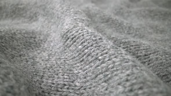 Extreme Detail View of Sheep Wool Cloth Texture Flowing in Macro Dolly Shot