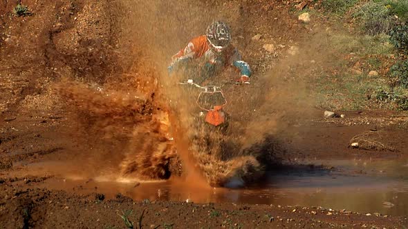 Biker Splashing Mud