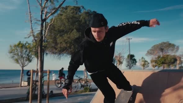 Skater Boy Practicing at Skate Park