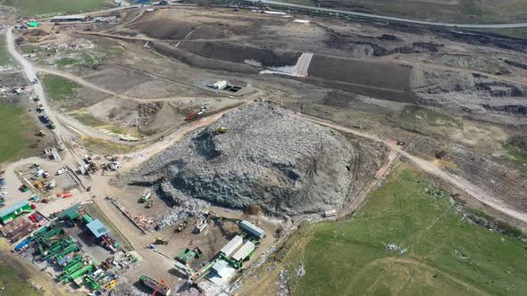 Garbage pile in trash dump or landfill near Cluj-Napoca, Romania.Pollution concept. Drone view.