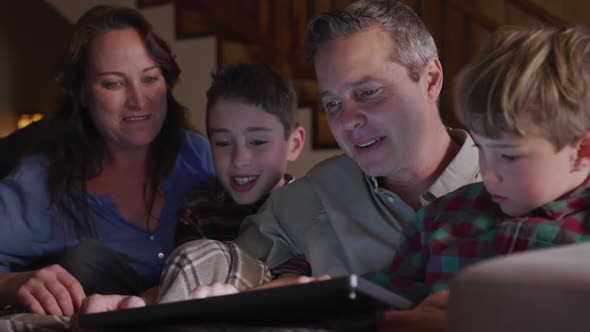 Family spending time together at home in the evening