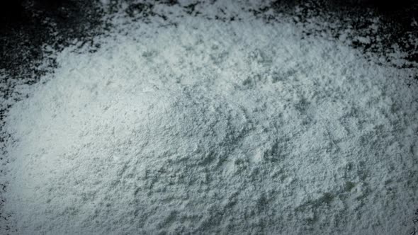 White Powder Is Poured Into Pile