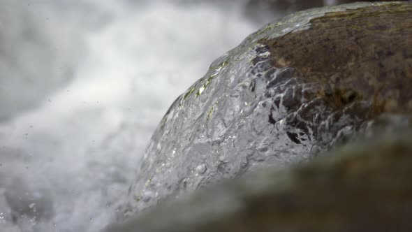 The Air Gap Below the Water Flowing From the Rock