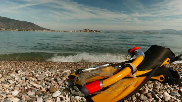 Flippers And Snorkeling Tube On Beach. Timelapse