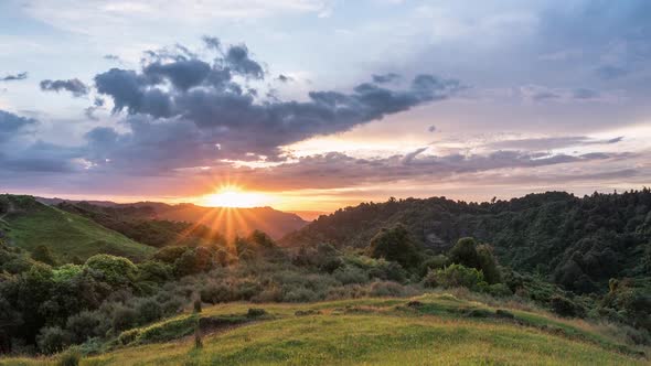 Sunset with Dramatic Cluds in Wild Nature New Zealand Landscape