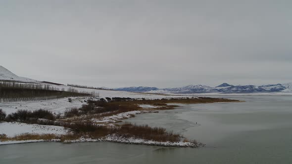 Ice forms along the shoreline of the south end of Utah Lake near Lincoln Beach, looking toward the w