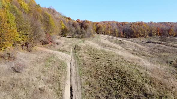 Aerial view of hills on autumn season. Fall colors of a forest in Autumn Season