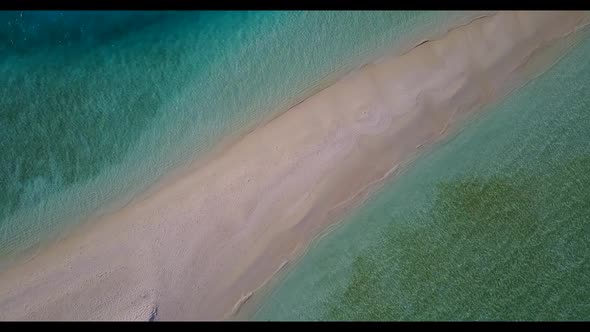 Aerial texture of perfect seashore beach time by blue water and white sandy background of a dayout n