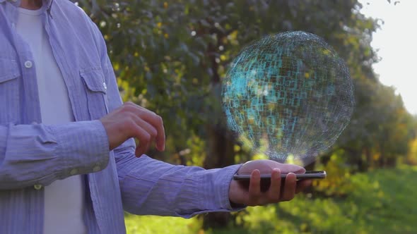 Unrecognizable Man Shows Conceptual Hologram with Text Big Data