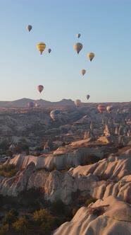 Vertical Video of Hot Air Balloons Flying in the Sky Over Cappadocia Turkey